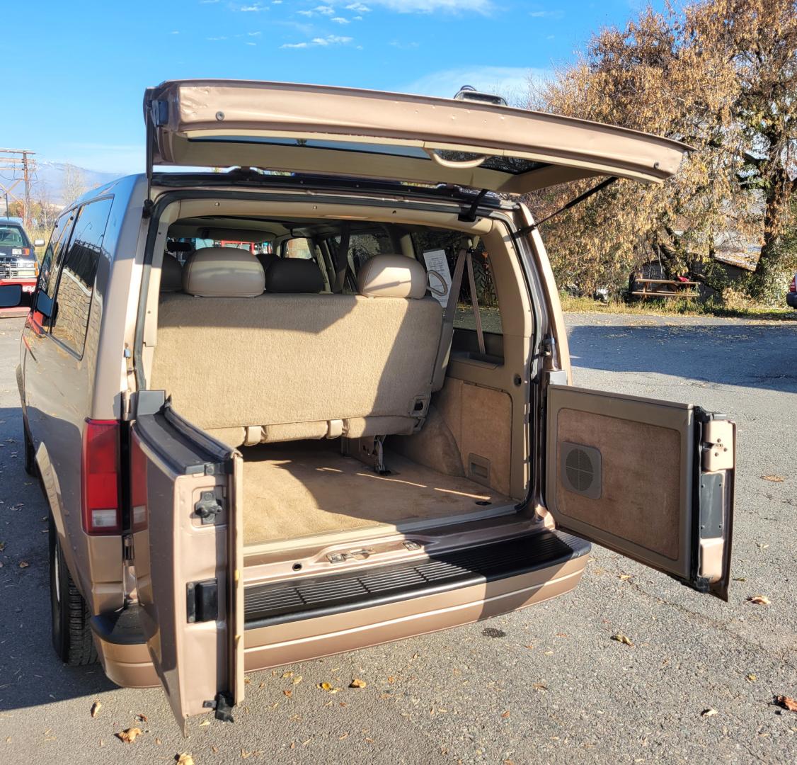 1996 Brown /Tan Chevrolet Astro (1GNEL19W0TB) with an 4.3L V6 engine, Automatic transmission, located at 450 N Russell, Missoula, MT, 59801, (406) 543-6600, 46.874496, -114.017433 - Hard to Find All Wheel Drive Astro Van. Only 86K Miles. Runs Great. Automatic Transmission. Air Conditioning. Cruise Control. 3rd Row Seating. This vehicle is more then 20 years old and is not eligible for lending through our finance companies - Photo#9